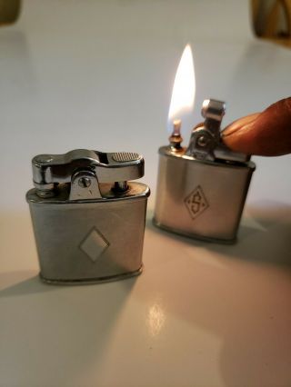 2 Vintage Ronson De - Light And Standard Pocket Lighters,  Silvertone.
