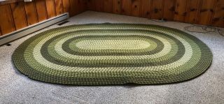 Braided Vintage Oval 11 ' x 8 ' rug Shades of Green 2