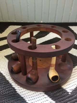 Vintage wooden pipe stand/holder,  with 4 pipes.  Holds 9 3