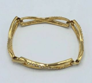 Vintage Swarovski Swan Signed Gold Tone Rhinestone Articulated Tennis Bracelet
