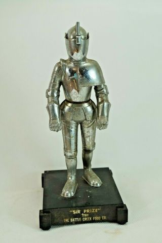 (sir Prize) The Battle Creek Food Co.  Knight In Armor Cigarette Lighter 7 " Tall