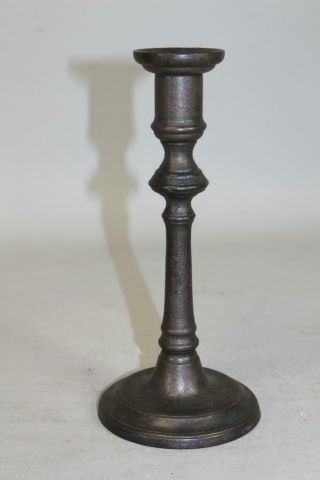 A RARE 18TH C CAST IRON QUEEN ANNE STYLE CANDLESTICK IN OLD BLACKENED SURFACE 2