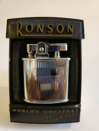 Vintage Ronson Triumph Lighter In Display Case.