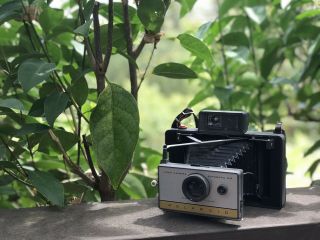Vintage Polaroid 215 Land Camera,  Strap,  Cold Clip & Manuals