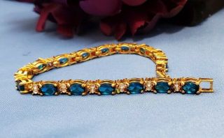 Vintage Avon Tennis Bracelet Peridot Blue Rhinestone Bracelet Blue Gold T1