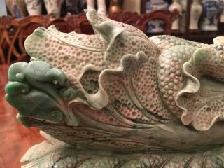 A Large And Rare Chinese Carved Jadeite Statue With Wooden Stand.