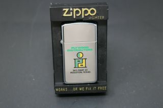 1985 Zippo Lighter Slim Line Chrome Plywood Distributors Inc.  Houston,  Tx