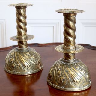 A Antique Dutch Brass Candlesticks,  Repoussé Decoration,  19.  5cm High.