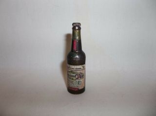 Vintage Ancient Age Push Top Bottle Opener