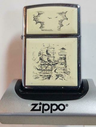 Graphic & Good - Looking Scrimshaw Zippo Lighter - Ship & Lighthouse –