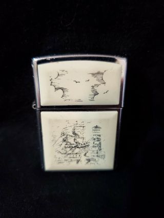 Zippo Lighter With A Scrimshaw Ship Design On Front