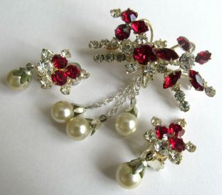 Vintage Brooch And Clips Set With Sparkling Red And Clear Stones.