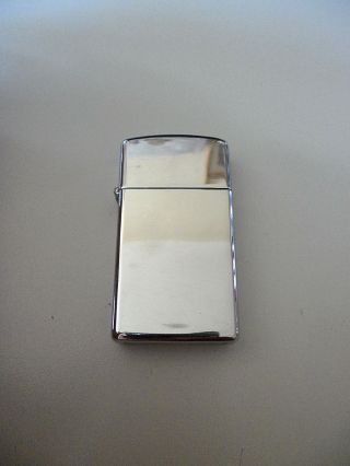 Zippo Slim Vintage Lighter High Polished Chrome 1996 L Xii