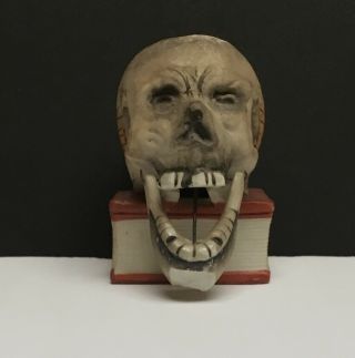 Vintage 1920’s Bisque Macabre Skull Book Bobble Nodder Jaw Match Candle Holder