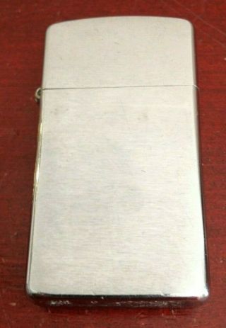 Collectible 2000 Brushed Chrome Xvi Slim Zippo Lighter.  Made In Usa