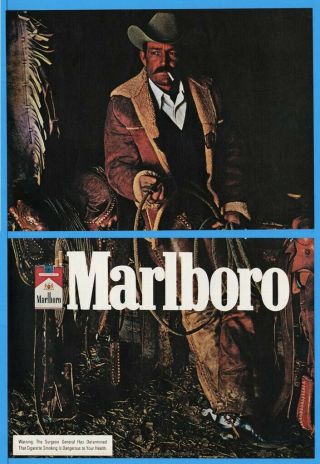1974 Marlboro Man In Camp Fire Light Photo Cowboy Horse Saddle Print Ad