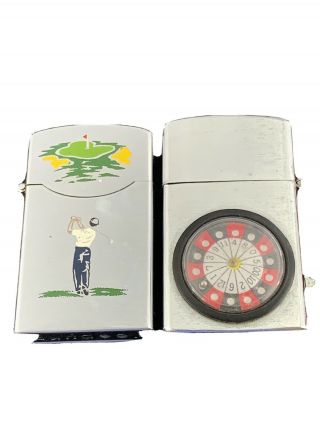2 Vintage Flip Top Pocket Lighters - - Dundee Golfer - Roulette Wheel