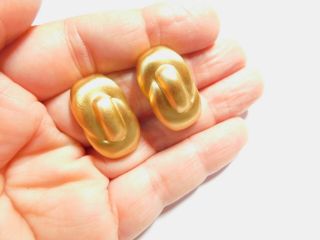 Signed Monet Matte Gold Tone Metal Knot Clip On Earrings Vintage