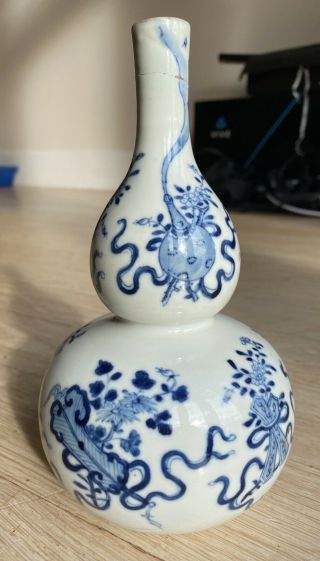 A Rare Early 19th Century Chinese Blue And White Gourd Vase