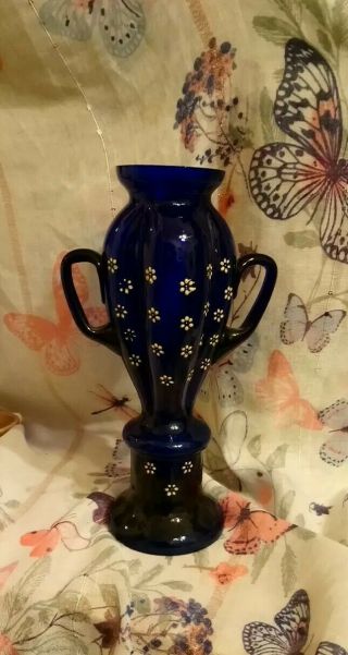 Vintage Blue Glass Vase With White Flowers On.    39
