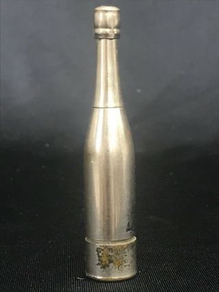 Vintage Utica Co.  Combination Cigarette Lighter/mechancial Pencil Champagne Bott