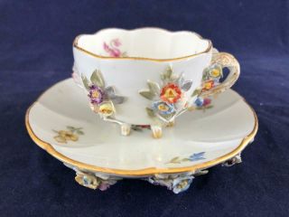 Fine Antique Meissen Porcelain Hand Painted Flower Encrusted Cup And Saucer.
