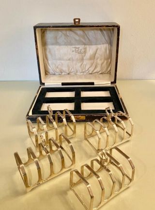Fine Set Of Four English Sterling Silver Toast Racks