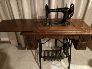 Antique/vintage 1890’s Queen Treadle Sewing Machine Fiddle Base Oak Cabinet