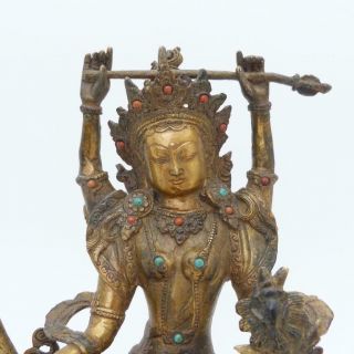 ANTIQUE SINO TIBETAN GILT BRONZE FOUR - ARMED BODHISATTVA INSET WITH WITH GEMS 2