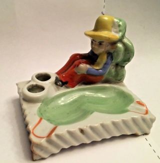 Vintage Porcelain Cigarette Holder And Ashtray.  Man Leaning On Cactus.  Two Hole