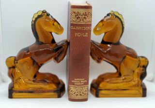 Vintage Viking/le Smith Amber Glass Rearing Trojan Horse Bookends