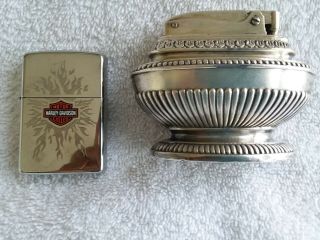 (2) Cigarette Lighters 1 Harley Davidson Zippo And 1 Ronson Queen Anne In Very