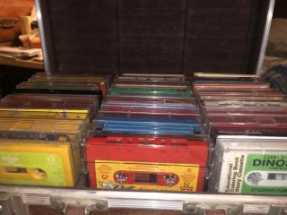 30 Various Vintage Disney And Others Children’s Tapes.  With Carrying Briefcase.