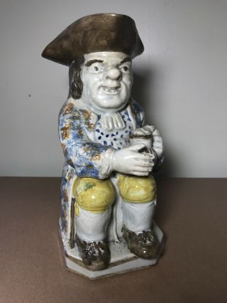 Antique Large Rare Toby Jug Seated Holding Pitcher And Pipe At Feet.