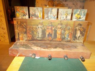Late 1800s Wooden Bowling Game With Mother Goose And Other Figures Pop Up Tiles