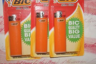 Bic Lighters " Slim Flick " Set Of (3) Orange Collectible In Package (uat - 10)