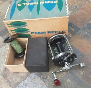 Vintage PENN Surfmaster 200 with extra spool in wrong box.  great 2