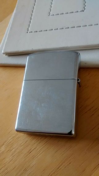 VERY GOOD,  ENGRAVED (LIBERTY) zippo lighter,  STRIKES WELL,  solid 3