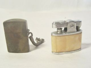 TWO VINTAGE SMALL CIGERETTE LIGHTERS/ BRASS MILITARY ?? MOTHER OF PEARL ?? 3