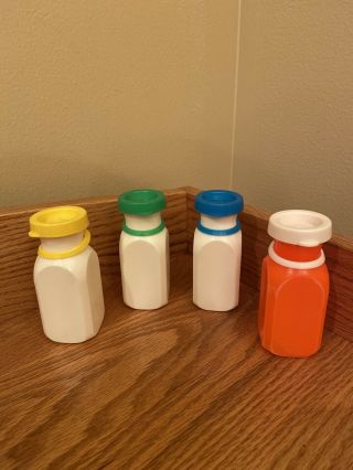Set Of (4) Vintage Fisher Price Milk Bottles White And Orange Juice With Lids