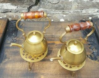 Vintage ornamental display x 2 small brass tea pots,  wooden handles on stands 2