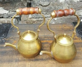Vintage ornamental display x 2 small brass tea pots,  wooden handles on stands 3