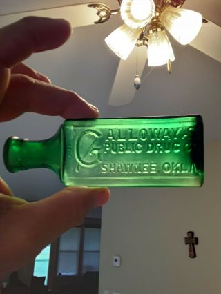 Antique Green Colored Shawnee Oklahoma Druggist Medicine Bottle.