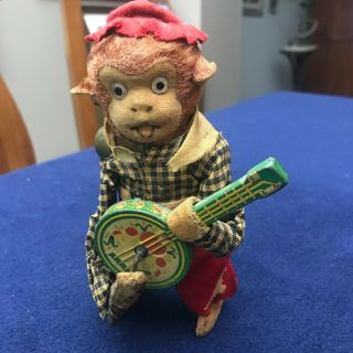Vintage Wind Up Toy Monkey Playing Guitar