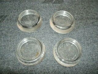 4 Vintage Glass Caster Cups.  2 " In Diameter