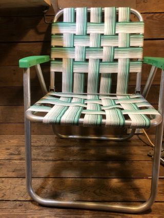 Vintage Webbed Lawn Chair Green Tan Aluminum Tube Frame Plastic Arms Garden Old