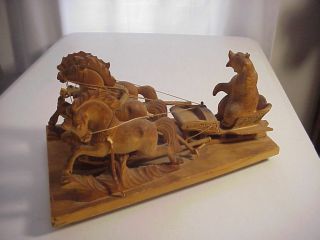 German Black Forest Wood Carving Of Troika With Carved Bear Driving 3 Horses