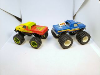 Vintage 1991 Hot Wheels Big Foot and Snake Bite Champions Ford Monster Trucks 2