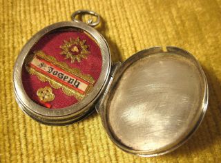 ANTIQUE & ORNATE SILVER LOCKET CASE WITH A RELIC OF ST.  JOSEPH 3