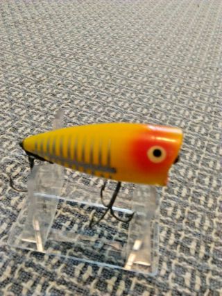 Old Lure Vintage Heddon Chugger Jr.  Lure With Yellow And Silver Stripes.
